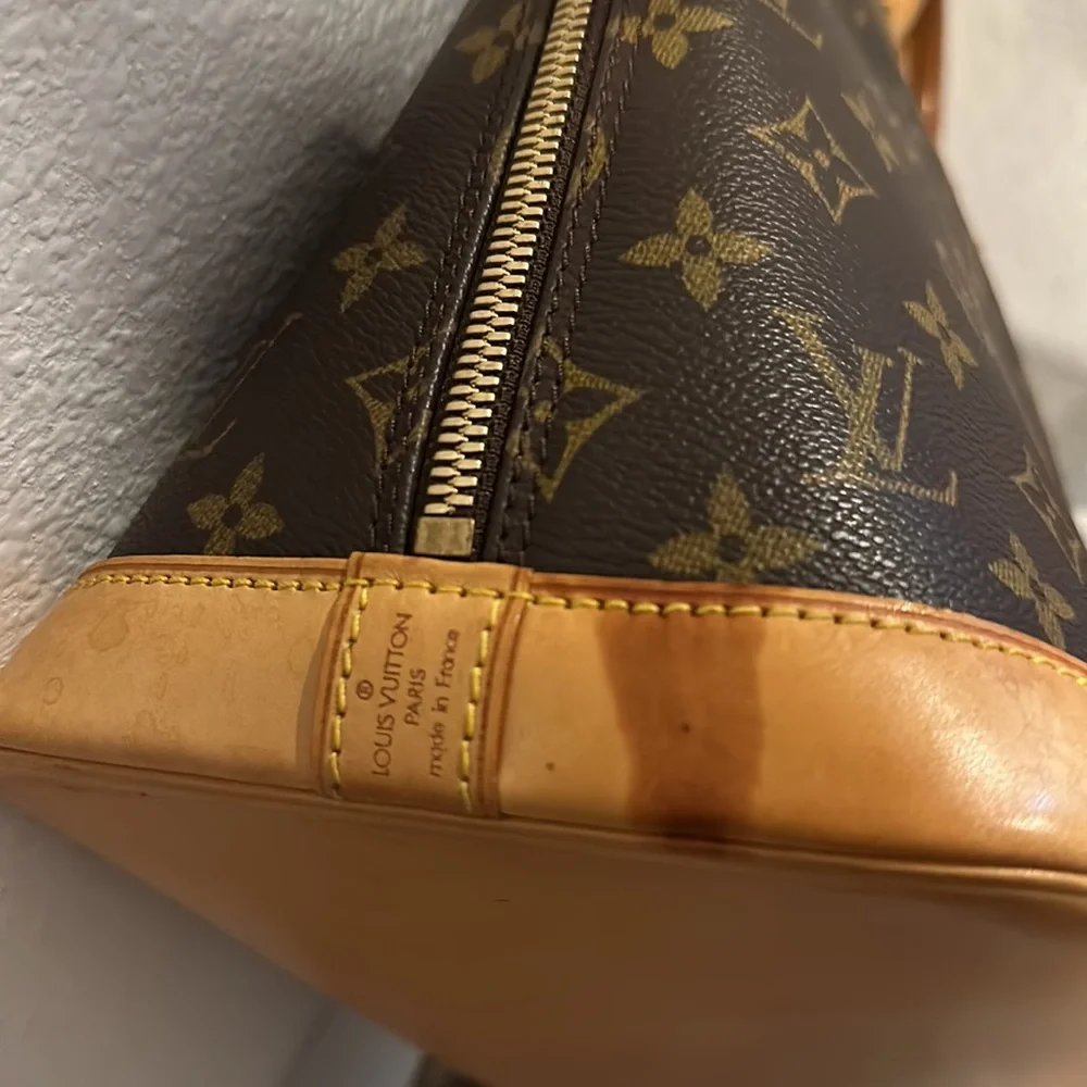 BA1013 Authentic Louis Vuitton Alma handbag - Picture 6 of 12